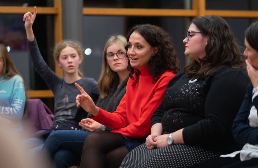 Volunteers with a program now called Meet a Jew talk with non-Jewish students at a school in Frankfurt, Nov. 5, 2019 (photo credit: FRANK RUMPENHORST/PICTURE ALLIANCE VIA GETTY IMAGES/JTA)