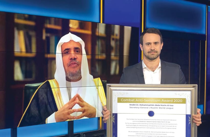 SACHA ROYTMAN DRATWA presents an award to Sheikh Dr. Mohammed al-Issa, secretary-general of the Muslim World League (photo credit: Courtesy)