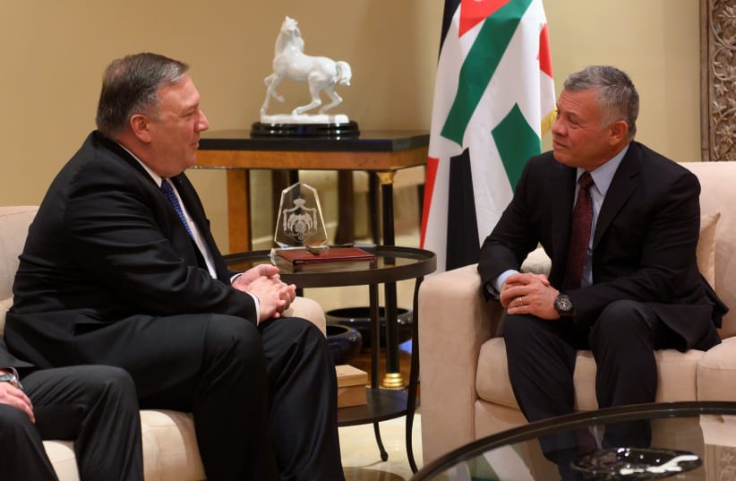 U.S. Secretary of State Mike Pompeo (L) meets with King Abdullah of Jordan (R) during his visit to Amman, Jordan, January 8, 2019 (photo credit: ANDREW CABALLERO-REYNOLDS/POOL VIA REUTERS)