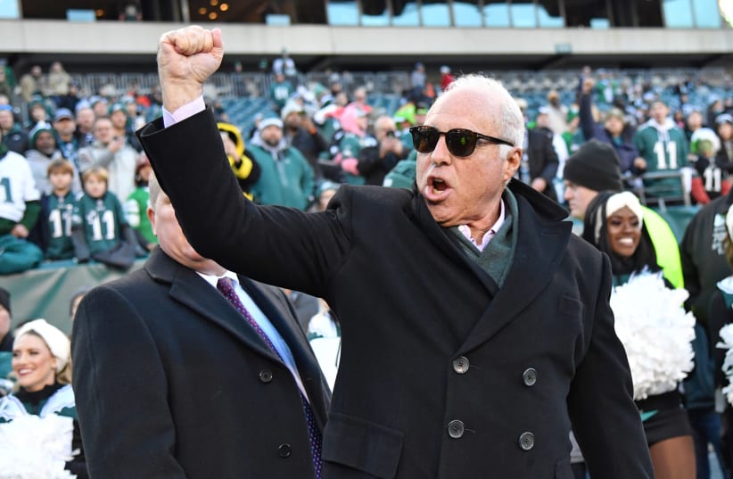 Philadelphia, Pennsylvania, USA; Philadelphia Eagles owner Jeffrey Lurie acknowledges the crowd as he walks onto the field during warmups against the Dallas Cowboys at Lincoln Financial Field. (photo credit: USA TODAY)