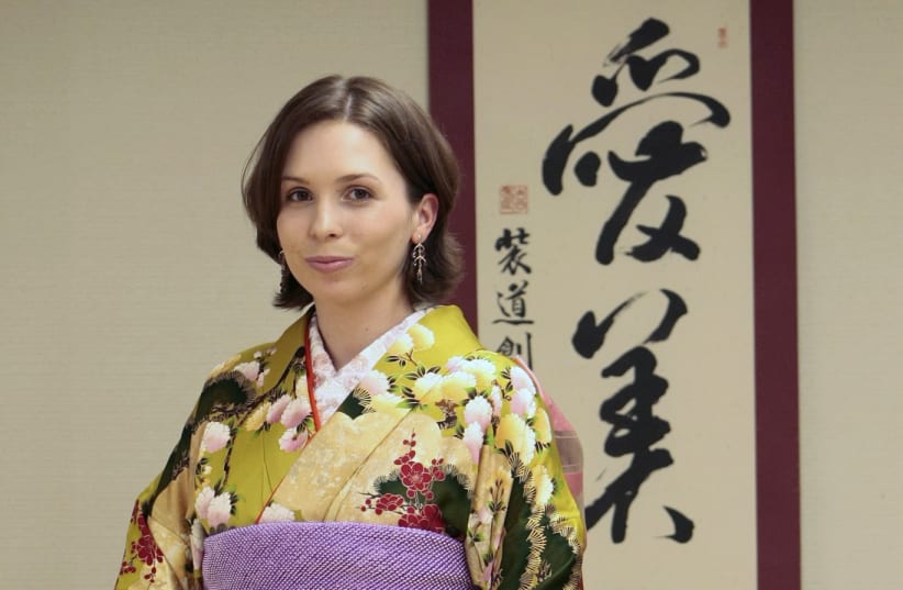 Jordan's Princess Raiyah poses as she tries on a Japanese kimono during her visit to a kimono dressing academy in Tokyo, April, 2009 (photo credit: REUTERS/SHIZUO KAMBAYASHI/POOL)