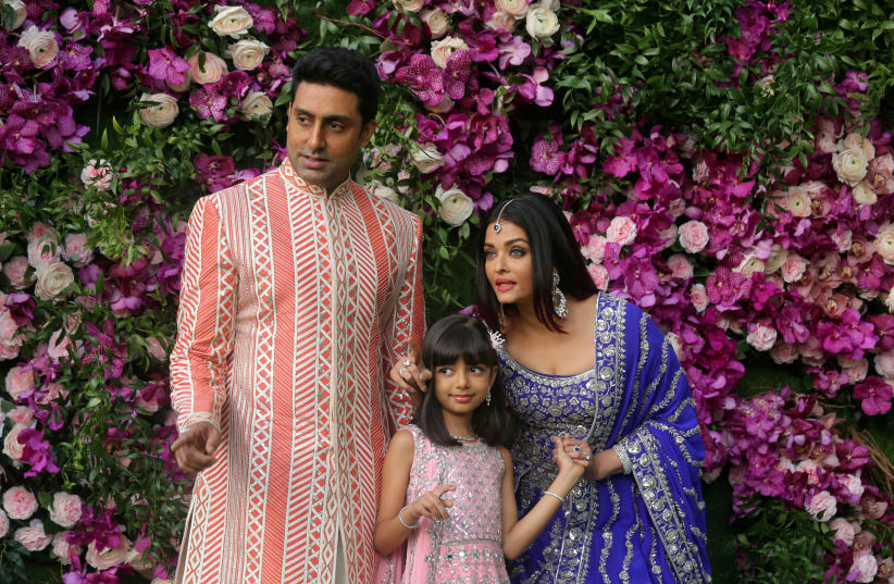 Indian film actor Abhishek Bachchan, his wife Aishwarya Rai and their daughter Aaradhya in a 2019 photograph (photo credit: REUTERS/FRANCIS MASCARENHAS)