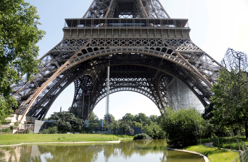 A view shows the Eiffel Tower in Paris on its reopening day to the public following the coronavirus disease (COVID-19) outbreak in France, June 25, 2020 (photo credit: REUTERS)