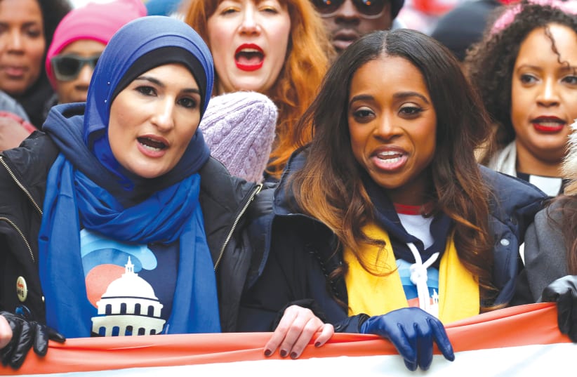 LINDA SARSOUR and Tamika Mallory walk in the third annual Women’s March in Washington last year. (photo credit: JOSHUA ROBERTS / REUTERS)