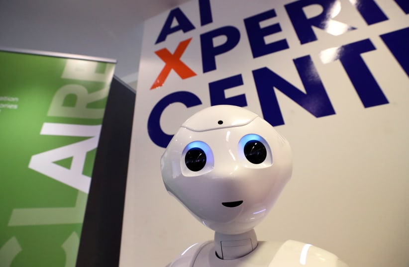 A robot equipped with artificial intelligence is seen at the AI Xperience Center at the VUB (Vrije Universiteit Brussel) in Brussels, Belgium February 19, 2020. (photo credit: YVES HERMAN/REUTERS)