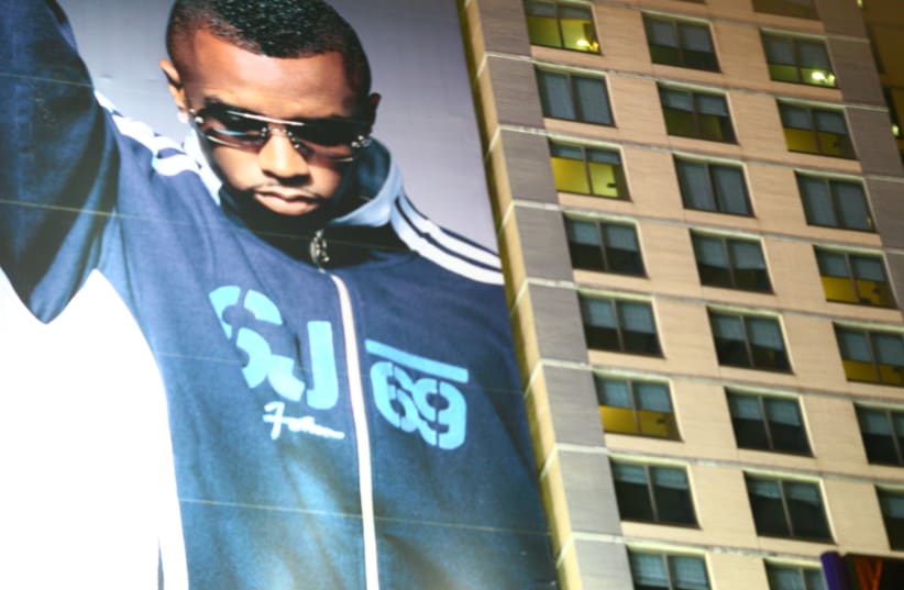 HIP-HOP impresario Sean ‘Diddy’ Combs, seen here on a New York City billboard, promoted Louis Farakkhan’s lecture in which he called the Jewish people ‘Satan.’ (photo credit: FLICKR/*HIGHLIMITZZ)