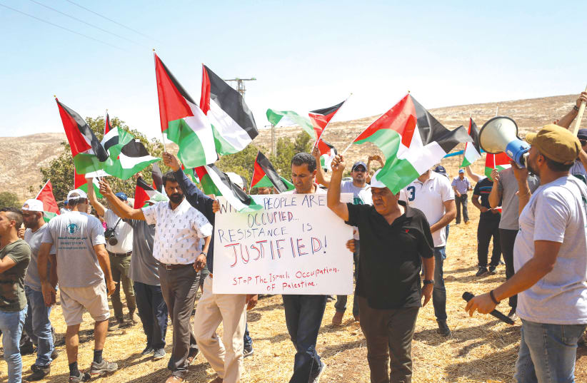 Palestinians demonstrate in the village of Kafr Malik northeast of Ramallah in September 2019.  (photo credit: FLASH90)