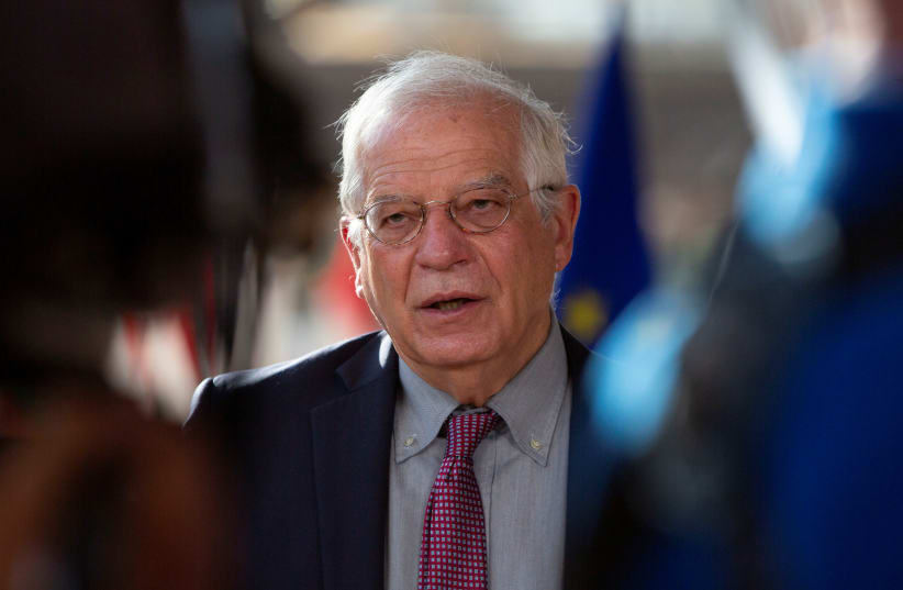 Chief Josep Borrell reads a statement as he arrives for a meeting of EU Foreign Ministers at the European Council building in Brussels, Belgium July 13, 2020. (photo credit: REUTERS/VIRGINIA MAYO/POOL)