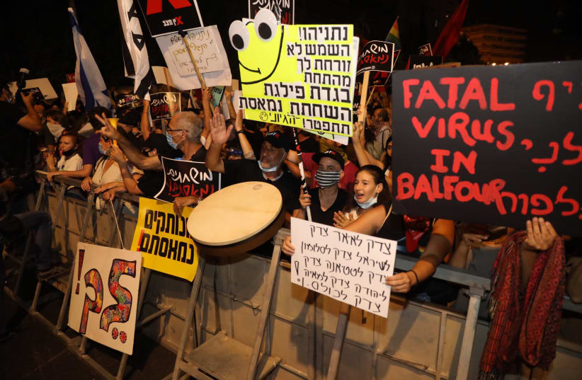 Protesters demonstrate outside the prime minister's residence in Balfour. (photo credit: MARC ISRAEL SELLEM)