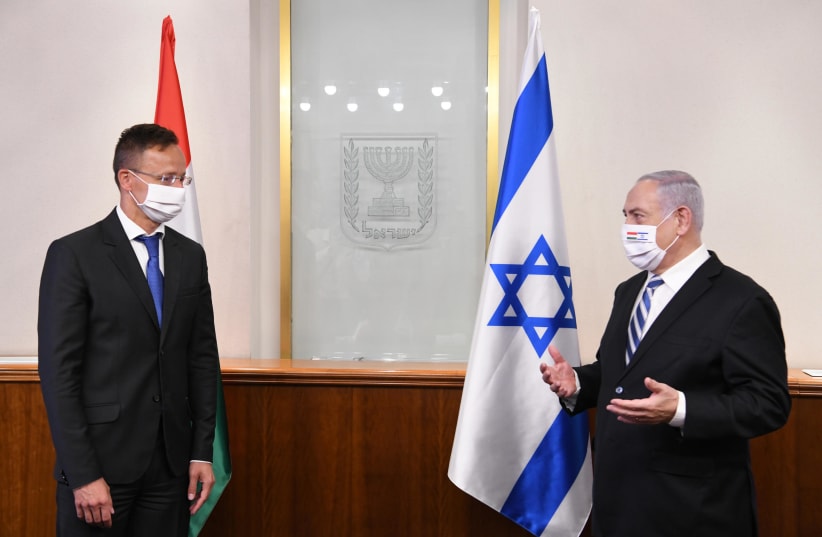 Prime Minister Benjamin Netanyahu during his meeting with Hungarian Foreign Minister, July 20, 2020 (photo credit: AMOS BEN GERSHOM, GPO)