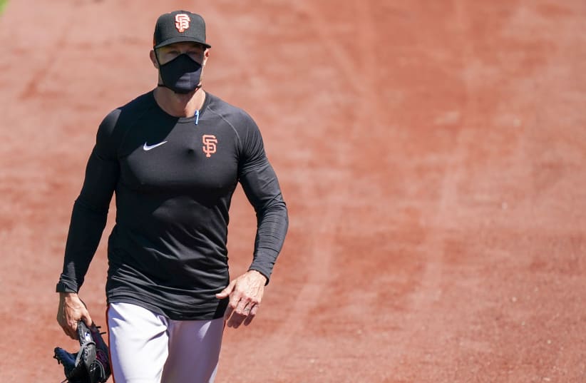  San Francisco, California, United States; San Francisco Giants manager Gabe Kapler (19) walks to the bullpen during a Spring Training workout at Oracle Park. (photo credit: KYLE TERADA-USA TODAY SPORTS)