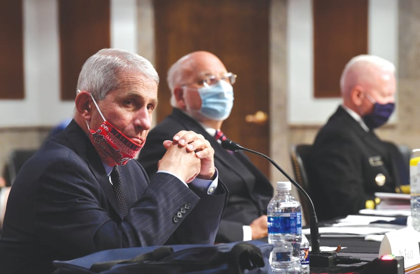 DR. ANTHONY FAUCI testifies during a Senate committee hearing on Capitol Hill last month. (photo credit: KEVIN DIETSCH/REUTERS)
