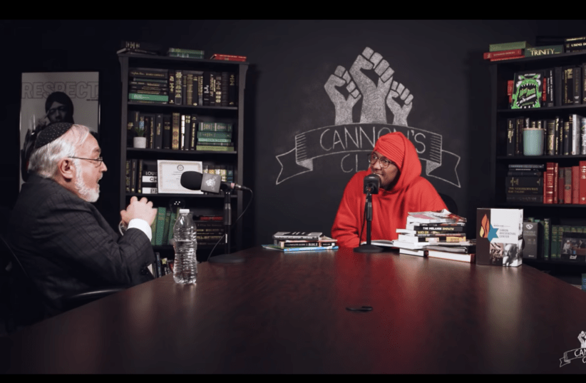 Rabbi Abraham Cooper, left, talks with Nick Cannon on an episode of his online "Cannon's Class" show. (photo credit: YOU TUBE)