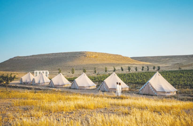 GLAMPING ISRAEL offers a variety of sleeping arrangements in natural surroundings, such as canvas tents, tepees, yurts, trailers, mud houses and luxury campsites, and a variety of outdoor activities and workshops.  (photo credit: GLAMPING ISRAEL/SHIMON KEREM)