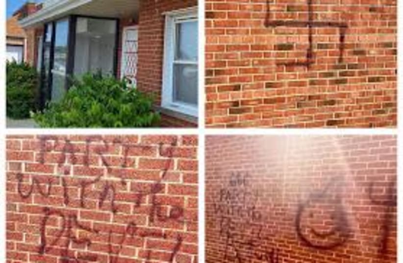 A swastika and other rude and antisemtic phrases spray painted onto buildings, including the Waxman Torah Center in Cleveland, Ohio, July 27, 2020. (photo credit: STOP ANTISEMITISM FACEBOOK PAGE)