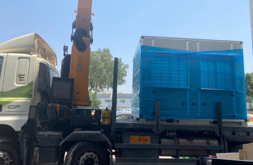 A Watergen generator was donated to Gaza's second largest hospital by Watergen Company and the Arava Institute for Environmental Studies with Palestinian partners, July, 2020. (photo credit: WATERGEN)