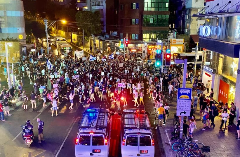 Hundreds of protesters gather in Tel Aviv to protest against police brutality and Amir Ohana, July 28. (photo credit: AVSHALOM SASSONI/ MAARIV)