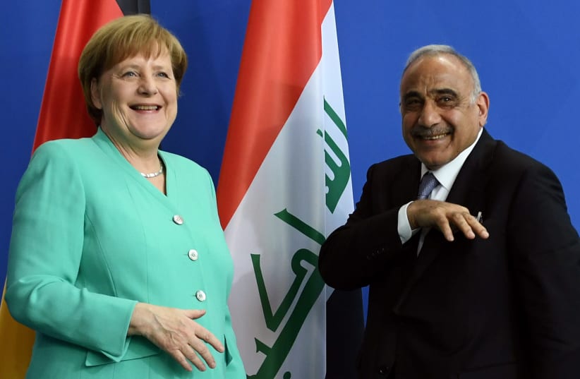 GERMAN CHANCELLOR Angela Merkel and Iraqi Prime Minister Adel Abdul Mahdi pose after an April 2019 news conference in Berlin (photo credit: ANNEGRET HILSE / REUTERS)