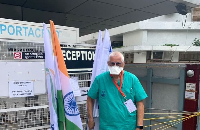 Dr. Nati Keller, Sheba Medical Center's senior clinical microbiologist, is seen in New Delhi, India, as part of an elite team to help combat COVID-19. (photo credit: SHEBA MEDICAL CENTER)