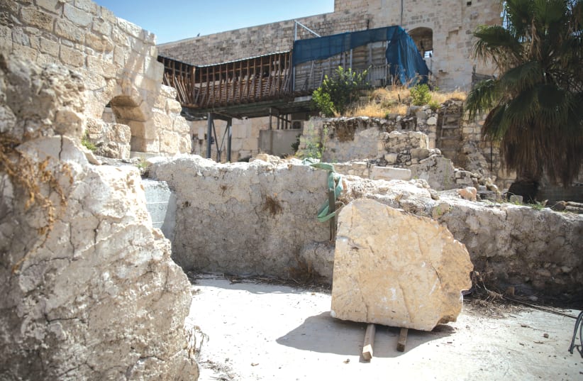 A LARGE STONE dislodged from the Western Wall in Jerusalem’s Old City at the mixed-gender prayer section on July 25, 2018.  (photo credit: HADAS PARUSH/FLASH90)