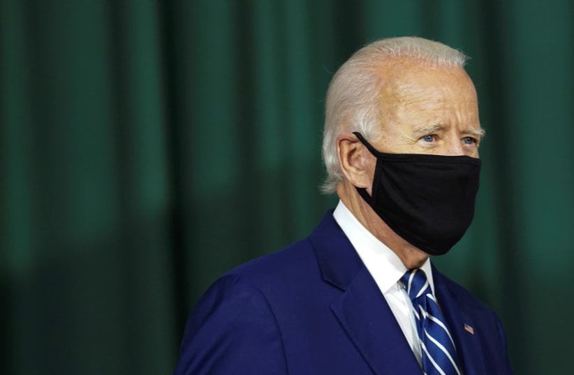 Democratic U.S. presidential candidate and former Vice President Joe Biden arrives to speak about his economic recovery plan to revive the coronavirus-battered U.S. economy during a campaign event in New Castle, Delaware, U.S., July 21, 2020 (photo credit: REUTERS/KEVIN LAMARQUE)