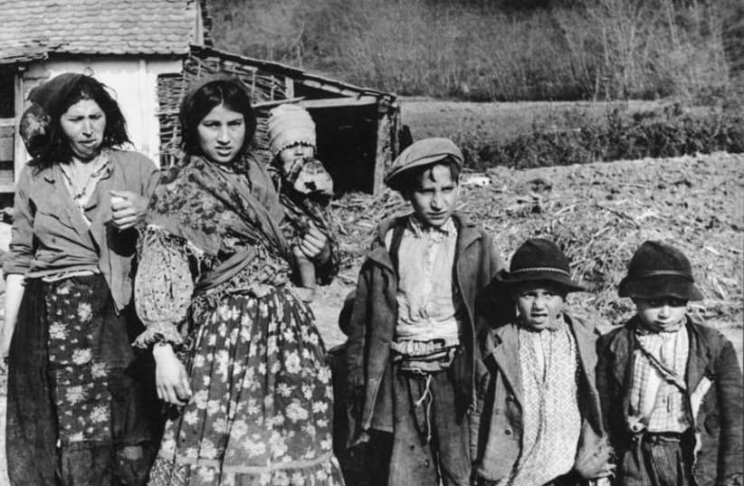 Croatian Sinti and Roma women and children, 1941 (photo credit: BUND ARCHIVES)