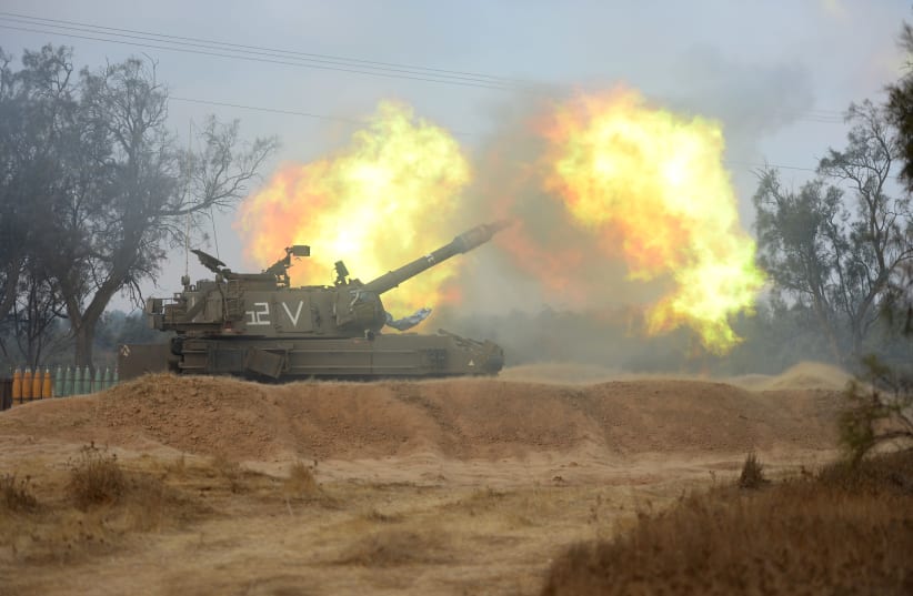 IDF Artillery Corps fires 155 mm M-109 howitzer gun during Operation Protective Edge, Gaza, 2014 (photo credit: IDF SPOKESPERSON'S UNIT)