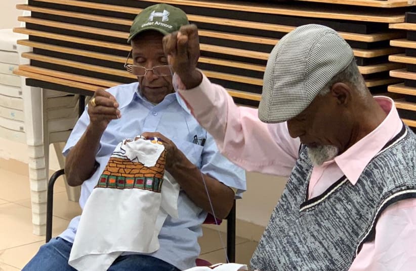 Founded by Zion Getahun, now director of the Ethiopian Community Center in the Talpiot neighborhood in Jerusalem, Embroidering Dreams has helped a group of older Ethiopian men regain their sense of self-worth and pride in their embroidery tradition (photo credit: ZION GETAHUN)