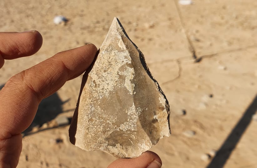 Tools made of stone show the migratory patterns of early humans (photo credit: EMIL ELJEM/ISRAEL ANTIQUITIES AUTHORITY)