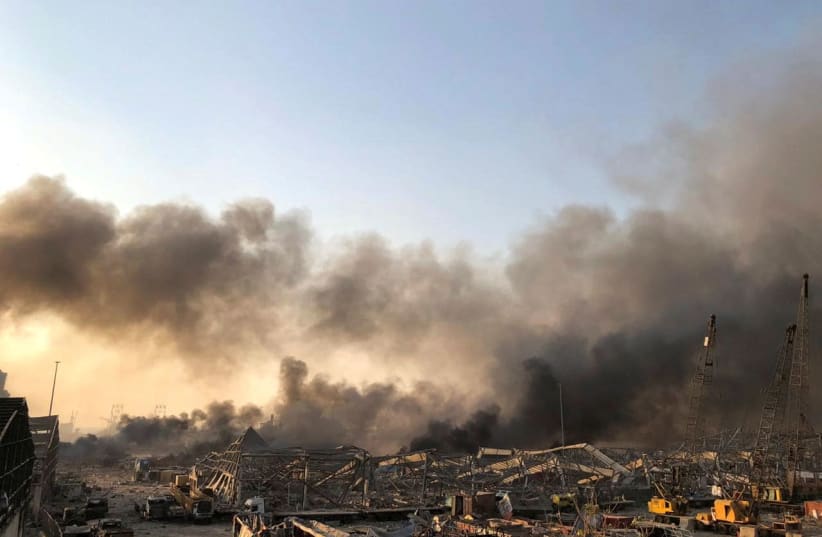 Smoke rises after an explosion was heard in Beirut, Lebanon August 4, 2020 (photo credit: REUTERS/ISSAM ABDALLAH)