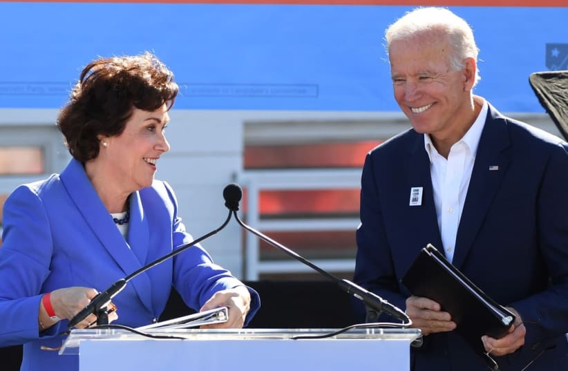 Then-Senate candidate Jacky Rosen introduces former Vice President Joe Biden as he campaigns for Nevada Democratic candidates during a rally in Las Vegas, Oct. 20, 2018.  (photo credit: ETHAN MILLER / GETTY IMAGES NORTH AMERICA / AFP)