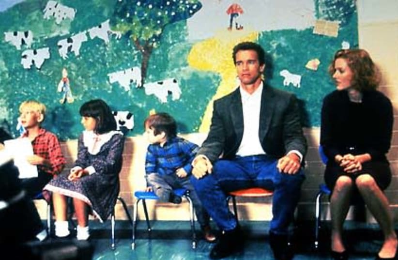 Arnold Schwarzenegger is seen in a scene from the 1990 film 'Kindergarten Cop.' (photo credit: GAIL MRS GRAY/FLICKR)