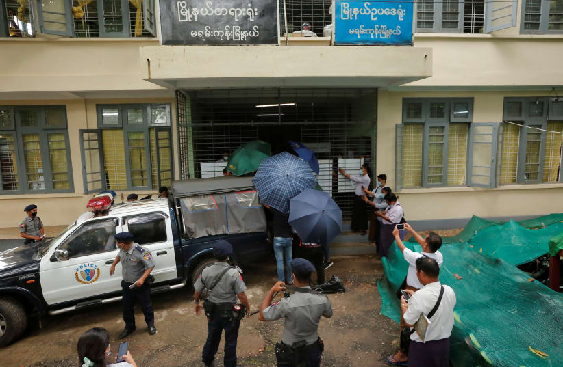 Burmese-Canadian preacher David Lah, who is accused of organising prayers in defiance of restrictions on gatherings imposed by the government during a lockdown due to the coronavirus disease (COVID-19) outbreak, arrives at a court in Yangon, Myanmar August 6, 2020. (photo credit: REUTERS/MYAT THU KYAW)