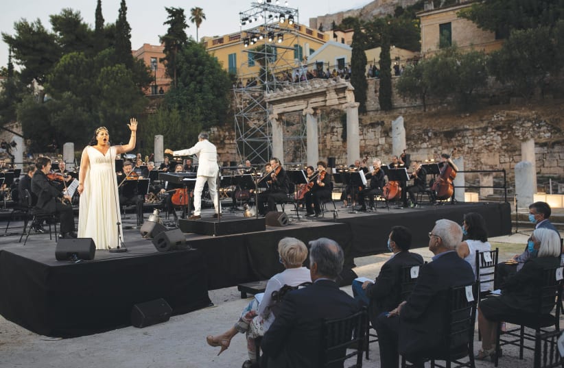 MEZZO SOPRANO Anita Rachvelishvili performs at the ancient Roman Agora in Athens during a Greek National Opera concert last month following the easing of COVID-19 measures. (photo credit: ALKIS KONSTANTINIDIS / REUTERS)
