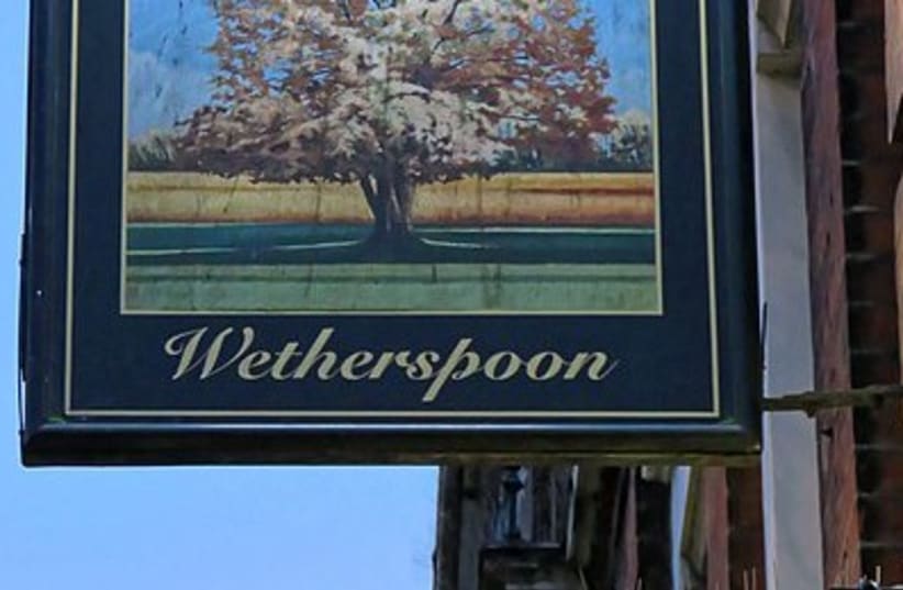 The pub sign of The Walnut Tree, a Wetherspoon pub on High Road in Leytonstone, London, England. (photo credit: Wikimedia Commons)
