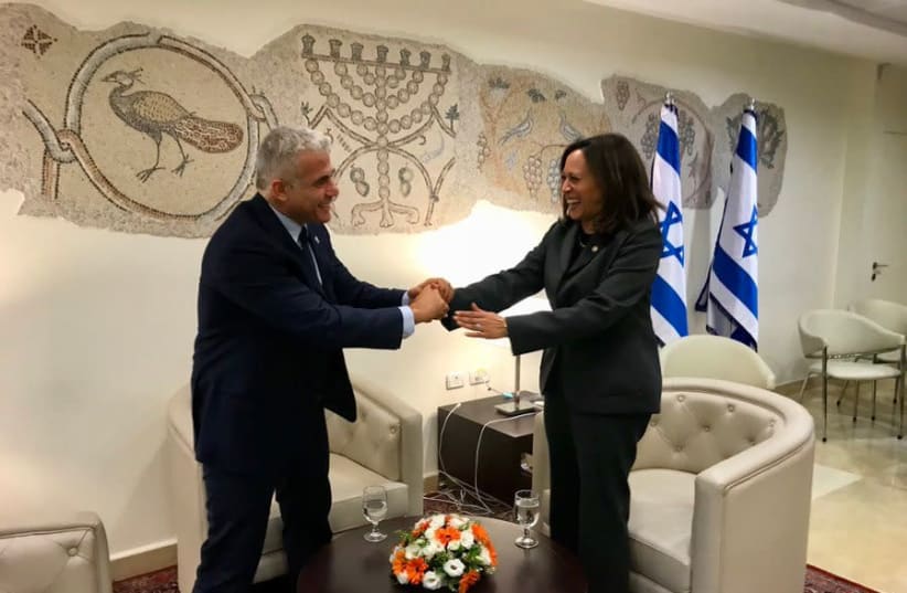 Opposition leader Yair Lapid with Kamala Harris in November 2017 (photo credit: COURTESY YESH ATID)