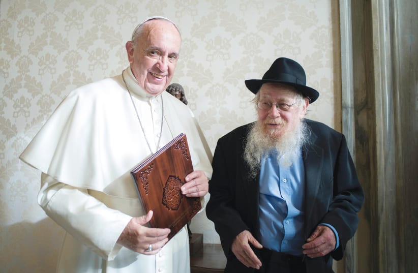 POPE FRANCIS poses with Rabbi Adin Even-Israel Steinsaltz during a private audience at the Vatican on December 5, 2016. (photo credit: OSSERVATORE ROMANO / REUTERS)