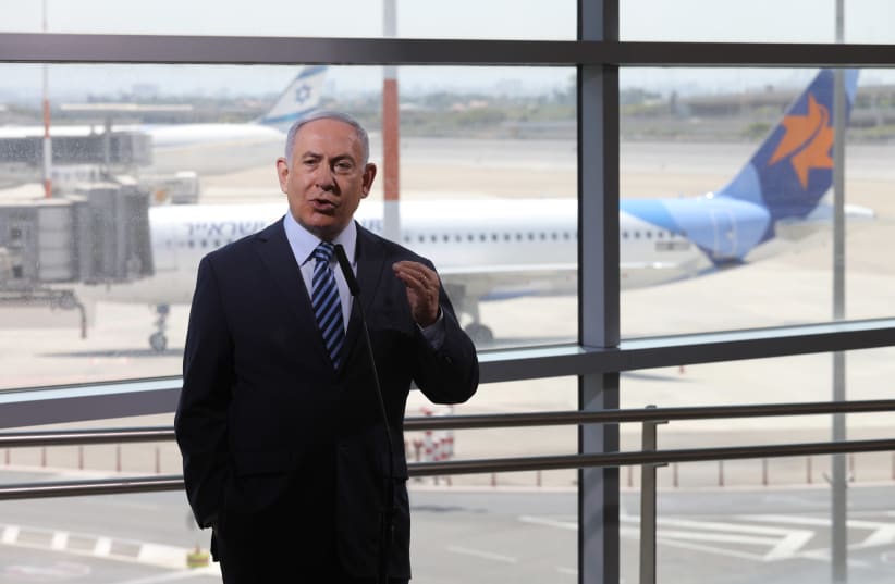 Prime Minister Benjamin visits Ben-Gurion Airport to oversee the reopening of the skies, August 17, 2020 (photo credit: EMIL SALMAN/POOL)