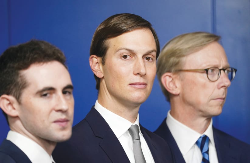 White House adviser Jared Kushner is flanked by aide Avi Berkowitz (left) and former US envoy to Iran Brian Hook. (photo credit: KEVIN LAMARQUE/REUTERS)