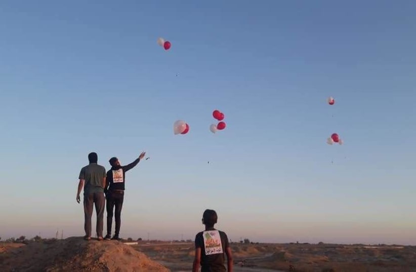 Balloon units launch incendiary and explosive units towards Israel from Gaza Strip (photo credit: SONS OF AL-ZAWARI BALLOON UNIT/TELEGRAM)