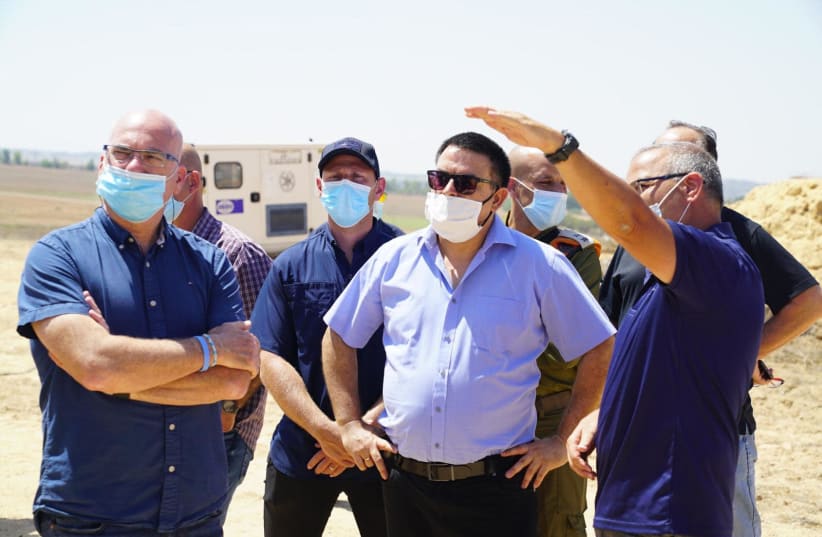 Defense Ministry's Civil and Social Issues Minister Michael Biton touring the Gaza Strip area, August 20, 2020. (photo credit: TAL OZ/DEFENSE MINISTRY/POLICE SPOKESPERSON'S UNIT)