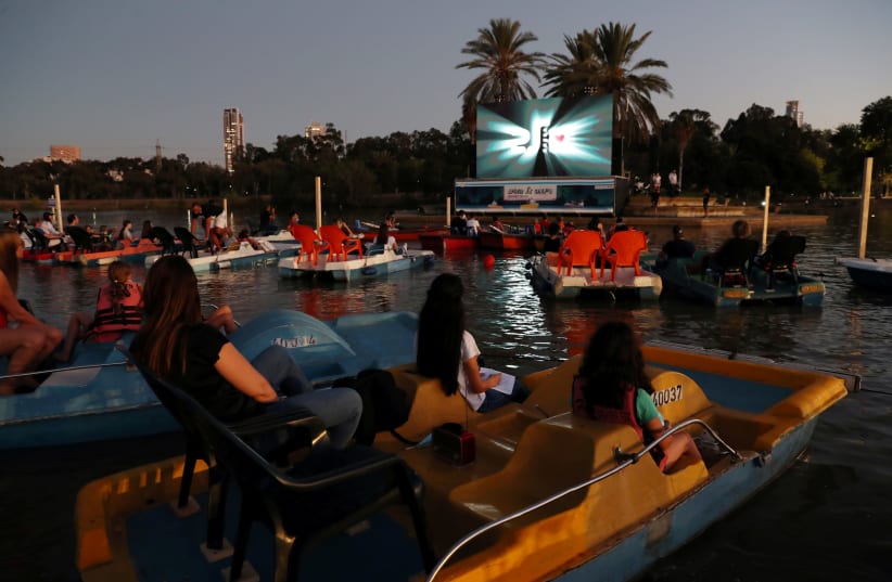 'Sail-in' theatre pops up in Tel Aviv, with indoor flicks off-limits (photo credit: RONEN ZVULUN/REUTERS)