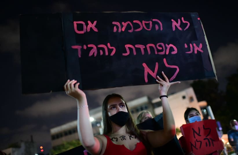 Israelis take part in a demonstration in support of the 16-year-old victim of a gang rape in Eilat, Tel Aviv. August 22, 2020 (photo credit: TOMER NEUBERG/FLASH90)