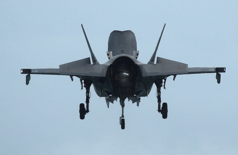 A U.S. Marine Corps F-35B Joint Strike Fighter hovers in an aerial display during a media preview of the Singapore Airshow in Singapore February 9, 2020. (photo credit: REUTERS/EDGAR SU)