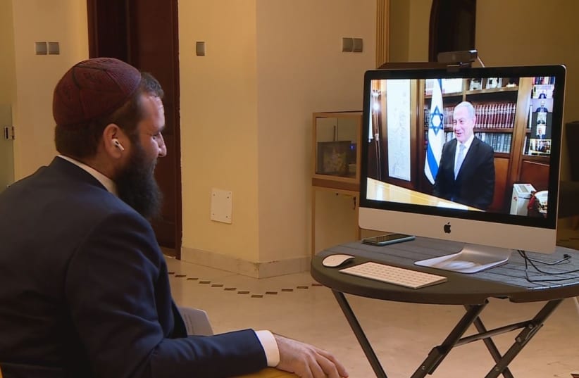 Rabbi Levi Duchman speaking via Zoom with Prime Minister Benjamin Netanyahu following the historic UAE-Israel peace deal, August 2020 (photo credit: COURTESY OF RABBI DUCHMAN)