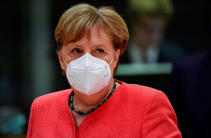 German Chancellor Angela Merkel looks on during the first faceto-face EU summit since the coronavirus disease outbreak in Brussels on July 20 (photo credit: REUTERS)