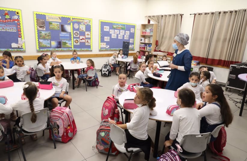 Students settle in for the first day of the new school year, Mevo Horon, September 1 (photo credit: MARC ISRAEL SELLEM/THE JERUSALEM POST)
