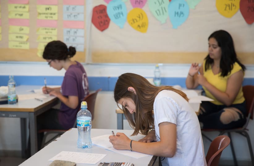 Keshet high school students take their mathematics matriculation examination (Bagrut), in Jerusalem on May 20, 2019 (photo credit: NOAM REVKIN FENTON/FLASH90)