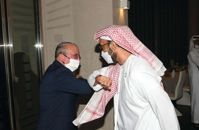 NATIONAL SECURITY Adviser Meir Ben-Shabbat meets with his Emirati counterpart, Tahnoun bin Zayed Al Nahyan, in Abu Dhabi, August 2020 (photo credit: AMOS BEN-GERSHOM/GPO)