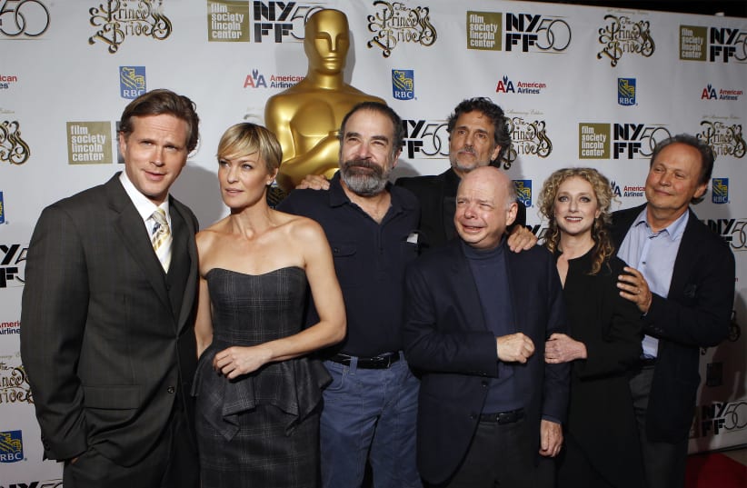 Cast members Cary Elwes, Robin Wright, Mandy Patinkin, Wallace Shawn, Chris Sarandon, Carol Kane, and Billy Crystal of the Princess Bride pose for a photograph as they arrive for a special 25th anniversary viewing of the film during the New York Film (photo credit: LUCAS JACKSON / REUTERS)